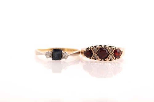 Lot 42 - A sapphire and diamond half hoop ring, the...