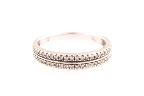 Lot 32 - A two-row diamond half hoop ring,composed of...