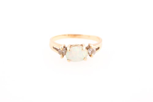 Lot 171 - An opal and diamond three stone half hoop ring;...