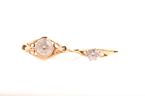 Lot 211 - Two clear stone set rings, one within...