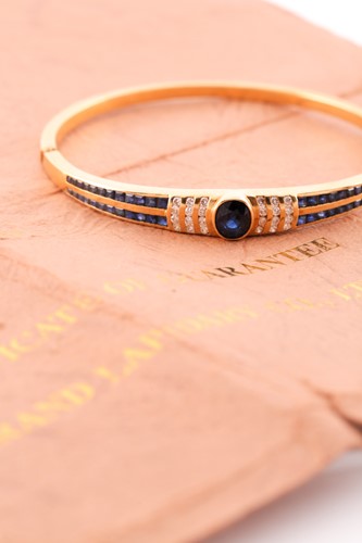Lot 245 - A sapphire and diamond bracelet; with a...
