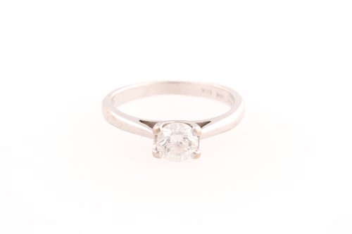Lot 339 - A single stone diamond ring, the round...