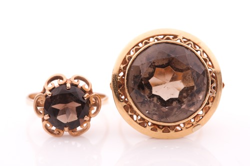 Lot 212 - A yellow metal and smoky quartz cocktail ring,...