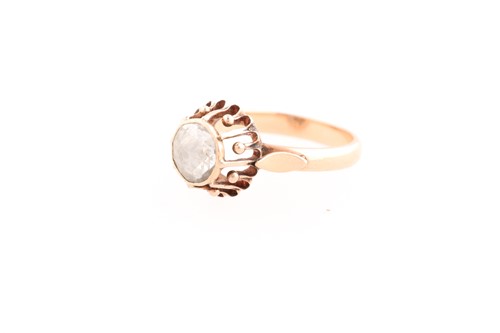 Lot 95 - A single stone diamond ring; the faceted...