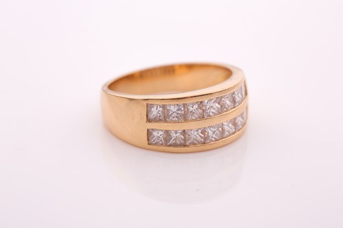 Lot 70 - A yellow metal and diamond ring, the band...
