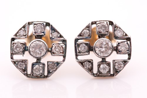 Lot 76 - A pair of diamond earrings, the openwork...