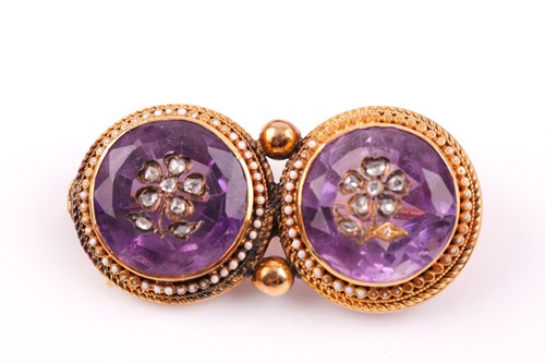 Lot 69 - A Victorian yellow gold and amethyst double...