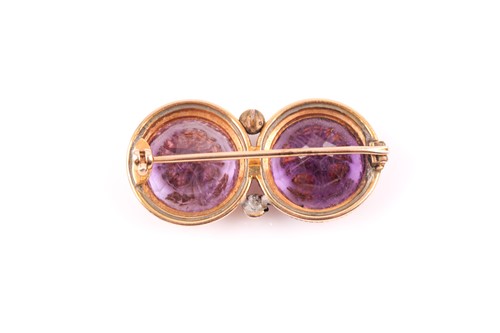 Lot 69 - A Victorian yellow gold and amethyst double...