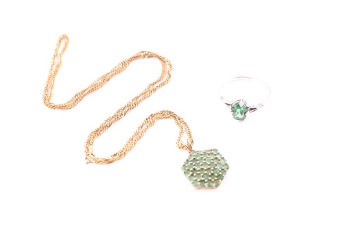 Lot 308 - A 9ct yellow gold and emerald pendant, of...