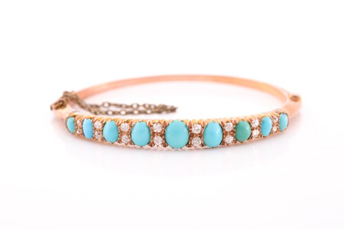 Lot 300 - A yellow metal, diamond, and turquoise bangle,...