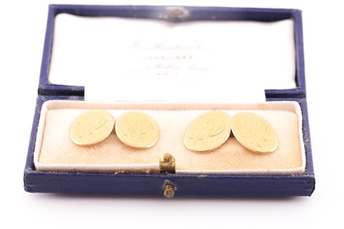Lot 187 - A pair of 18ct yellow gold cufflinks, the oval...