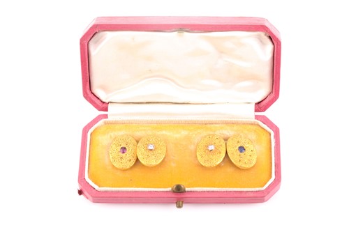 Lot 313 - A pair of 18ct yellow gold cufflinks, the oval...
