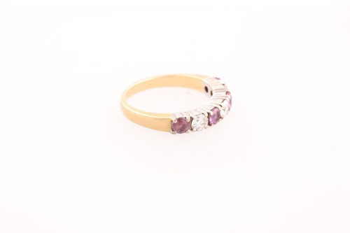 Lot 161 - An 18ct yellow gold, diamond, and pink...