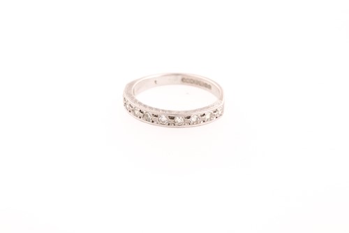 Lot 105 - An 18ct white gold and diamond half eternity...