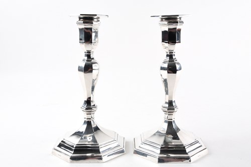 Lot 433 - A pair of late Victorian silver candlesticks...