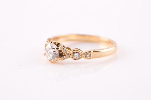 Lot 115 - An 18ct yellow gold and diamond ring, set with...