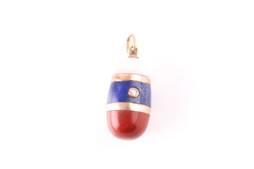 Lot 109 - A Russian 14ct gold polished stone pendant, of...