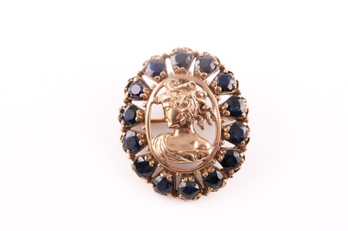 Lot 150 - A 9ct yellow gold and sapphire pendant /...