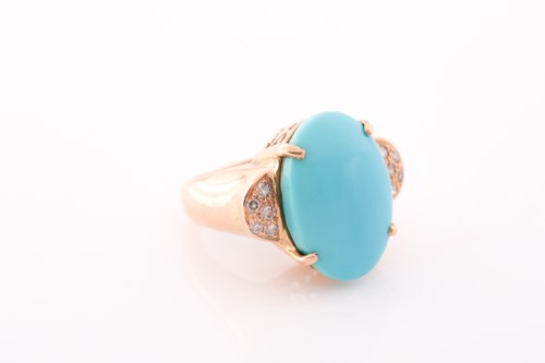 Lot 166 - A yellow metal and turquoise dress ring, set...