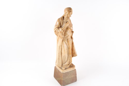 Lot 248 - Nicciole, a carved alabaster figure of an...
