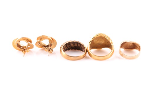 Lot 147 - An 18 ct yellow gold dress ring, the wide...