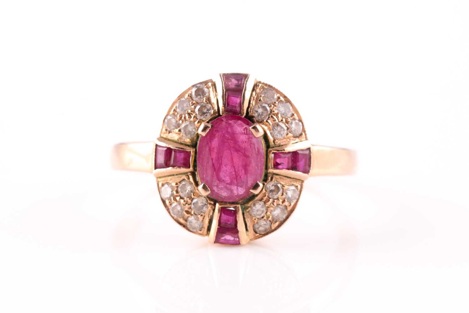 Lot 15 - A ruby and diamond cluster ring, the central...