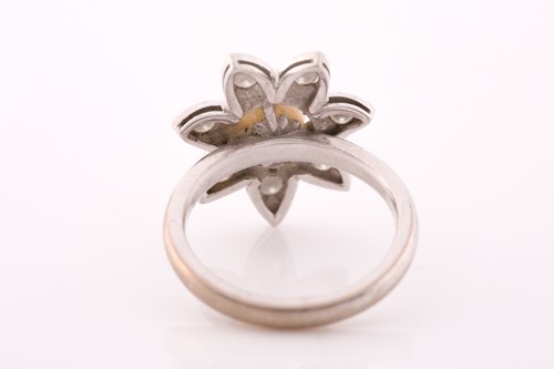 Lot 150 - An 18ct white gold, pearl, and diamond floral...