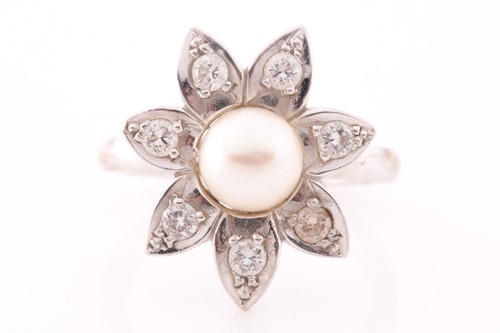 Lot 150 - An 18ct white gold, pearl, and diamond floral...
