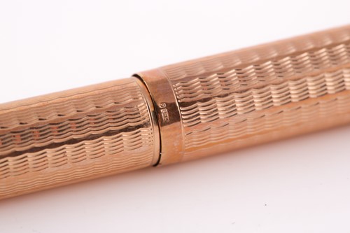Lot 387 - A 9ct gold Parker ball point pen, with...