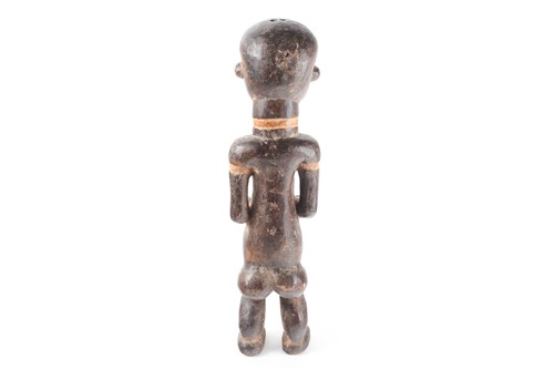Lot 166 - A Punu standing female figure, Gabon, the face...