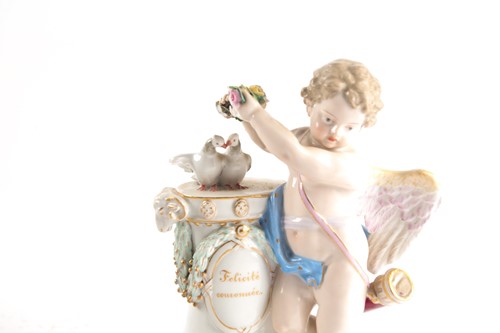 Lot 215 - A Meissen porcelain group of Cupid Felicite...