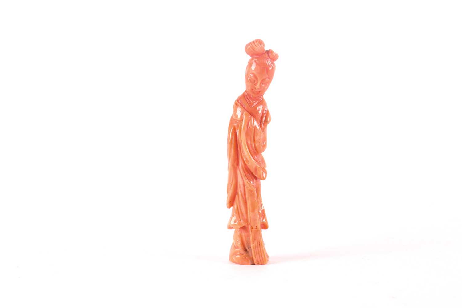 Lot 137 - A Chinese carved coral figure of Guanyin,...