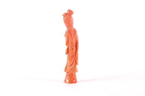 Lot 137 - A Chinese carved coral figure of Guanyin,...