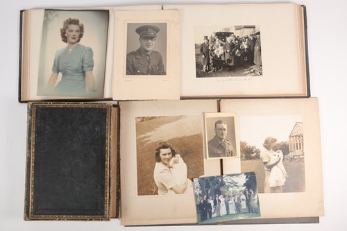 Lot 321 - An early 20th century photograph album...