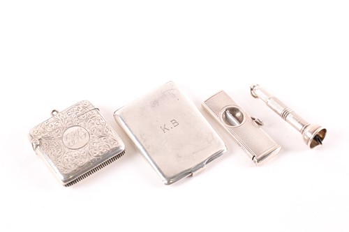 Lot 190 - A silver cigar cutter with engine turned...