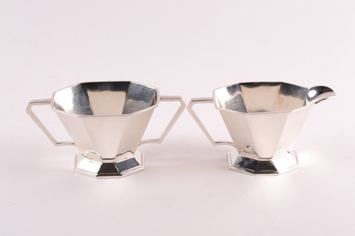Lot 428 - An Art Deco silver cream jug and sugar bowl,...