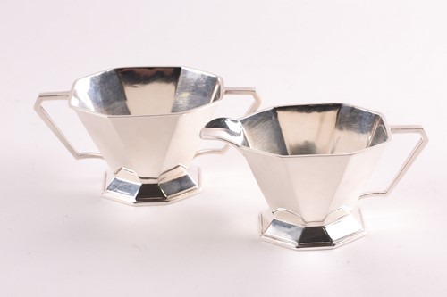 Lot 428 - An Art Deco silver cream jug and sugar bowl,...