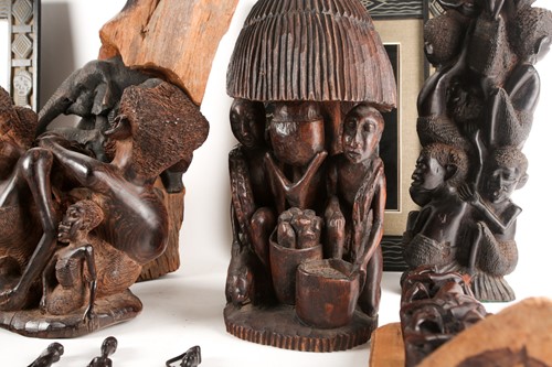 Lot 156 - A collection of Makonde blackwood carvings,...