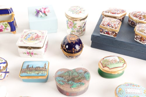 Lot 235 - Four Halcyon Days enamel pill boxes, together...