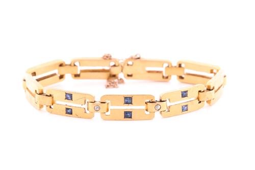 Lot 66 - A yellow metal, diamond and sapphire bracelet,...