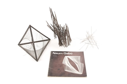 Lot 412 - Manner of Naum Gabo, an abstract wood and...