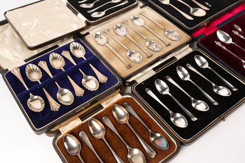 Lot 398 - A collection of cased tea/coffee spoons and...