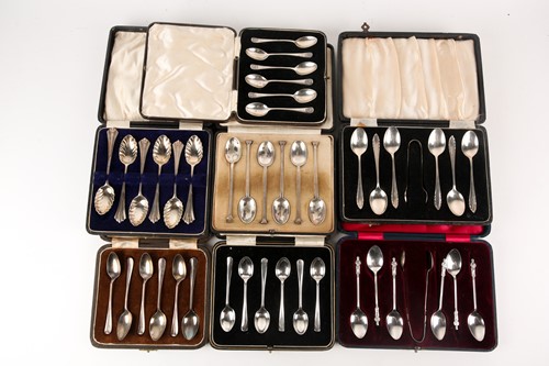 Lot 398 - A collection of cased tea/coffee spoons and...