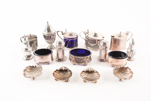 Lot 433 - A collection of silver cruet items including...