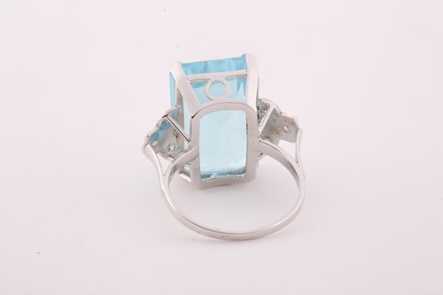 Lot 149 - A diamond and blue topaz cocktail ring, set...