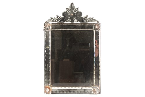 Lot 346 - A Venetian dressing table mirror, with scroll...