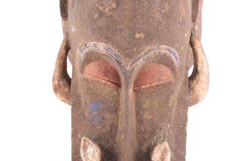 Lot 174 - A Senufo fire spitter mask, Ivory Coast, with...