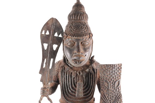 Lot 177 - A Benin bronze standing warrior figure,...