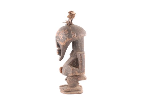 Lot 179 - A Songye standing male power figure, Nkisi,...