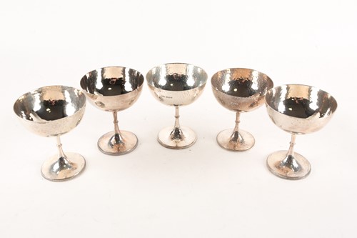 Lot 394 - A near set of five 1930s silver coupes,...